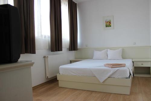 Katil atau katil-katil dalam bilik di Banu Manta Apartments