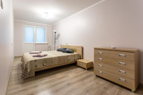 Ліжко або ліжка в номері Apartamentai Domeva