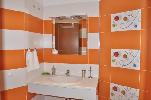 Salle de bains dans l'établissement Rado Apartments