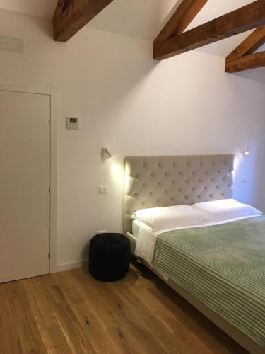 Postel nebo postele na pokoji v ubytování Bianca Cappello House