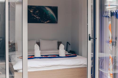 Ένα ή περισσότερα κρεβάτια σε δωμάτιο στο Ban Don Holidayhome