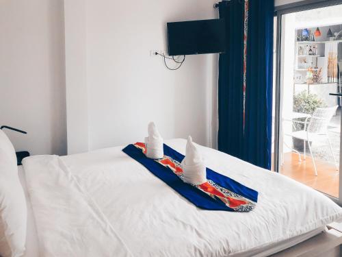 Ένα ή περισσότερα κρεβάτια σε δωμάτιο στο Ban Don Holidayhome