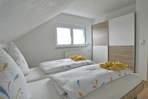 Postel nebo postele na pokoji v ubytování Ferienwohnung Zürn