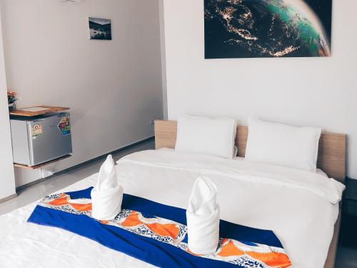 Ένα ή περισσότερα κρεβάτια σε δωμάτιο στο Ban Don Holidayhome
