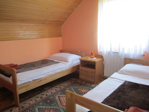 Ліжко або ліжка в номері Guest House Sveti Marko Gacka
