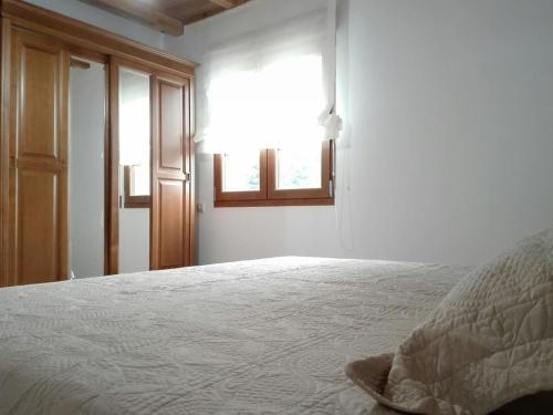 Postel nebo postele na pokoji v ubytování Casa de aldea Amezaga