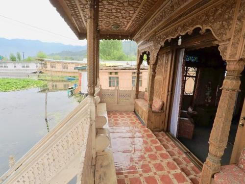 a view from the balcony of an old building at Houseboat Young Manhattan in Srinagar