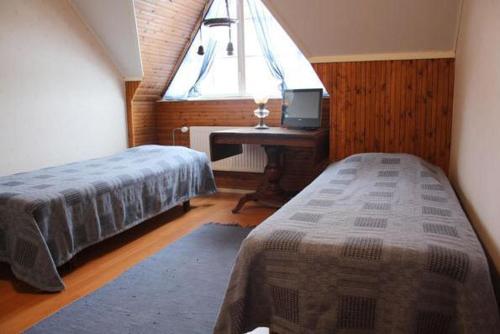 Posteľ alebo postele v izbe v ubytovaní Gasthaus Ii
