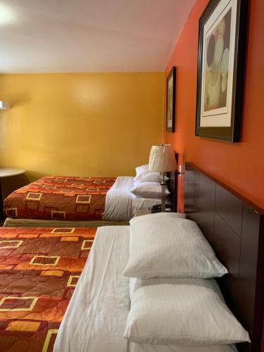 Scottish Inns Wrightstownにあるベッド