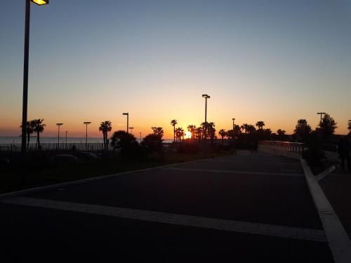 The sunrise or sunset as seen from a panziókat or nearby