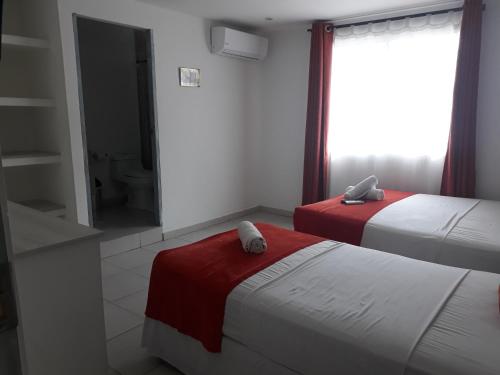 Cama o camas de una habitación en Mintaka Hotel + Lounge