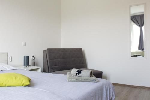 Ένα ή περισσότερα κρεβάτια σε δωμάτιο στο La Casa