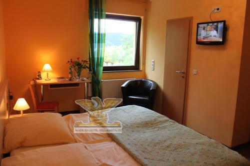 Tempat tidur dalam kamar di Rheinhotel Bellavista