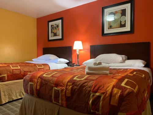 Scottish Inns Wrightstownにあるベッド