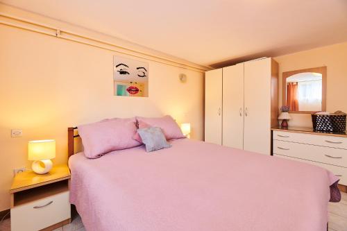 Ένα ή περισσότερα κρεβάτια σε δωμάτιο στο Apartment Ante