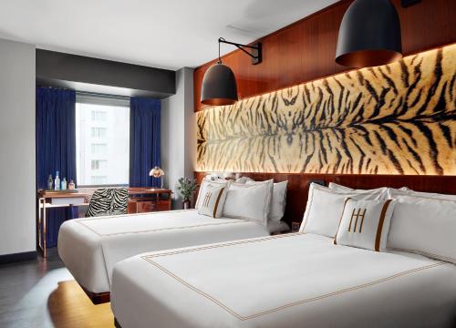 Cama o camas de una habitación en Hotel Hendricks