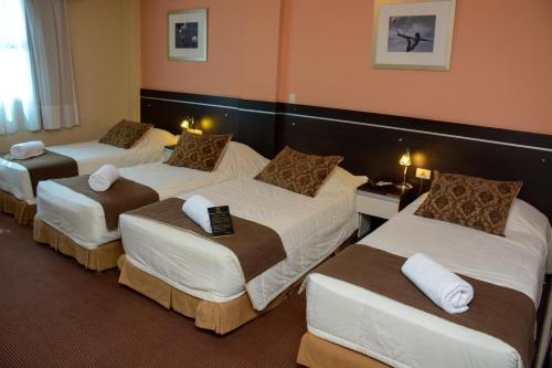 מיטה או מיטות בחדר ב-leclub resort hotel