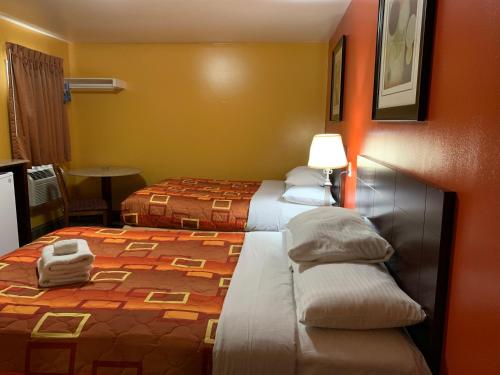 Scottish Inns Wrightstownにあるベッド