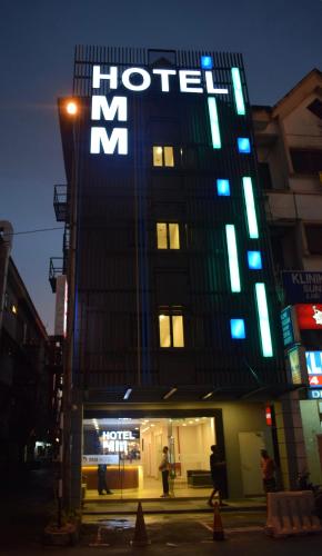 a hotel sign on the side of a building at Hotel MM @ Sunway in Petaling Jaya