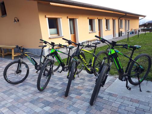 a group of bikes parked next to a building at Agriturismo Val Codera in Verceia