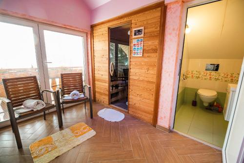 a room with a bathroom with a toilet at Luxury Apartment Ana with Hot tub in Višnja Gora