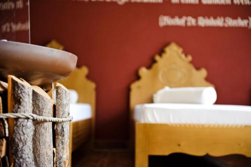 a close up of a room with yellow furniture at Hotel Stubaierhof in Neustift im Stubaital