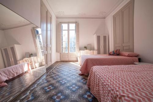 Posteľ alebo postele v izbe v ubytovaní b21-Apartamento Modernista para Grupos