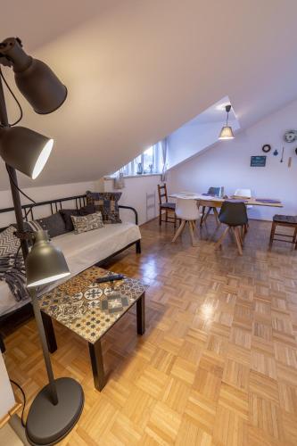 a living room with a couch and a table at Haus Agnes, Murau in Murau