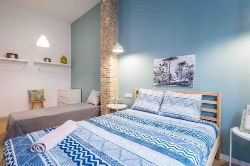 Postel nebo postele na pokoji v ubytování Cozy apartment Valencia city center!