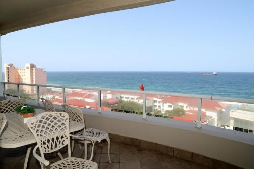 A balcony or terrace at 603 Oyster Schelles - by Stay in Umhlanga