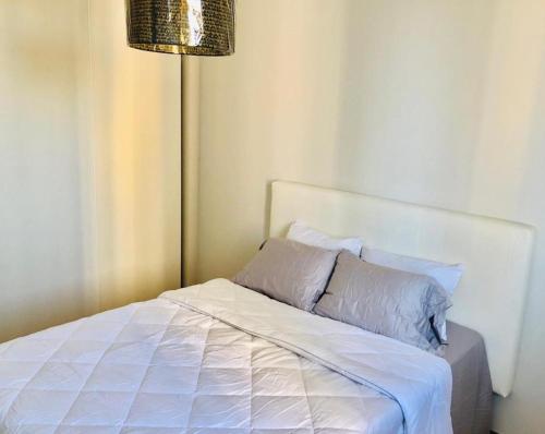 Postel nebo postele na pokoji v ubytování Delightful Ocean View Apartment - PH Quartier Del Mar