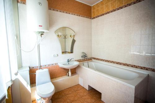 Koupelna v ubytování Premium Hotel