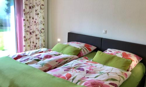 two beds sitting next to each other in a bedroom at Inselferien Micheel in Burg auf Fehmarn