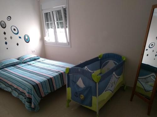 Postel nebo postele na pokoji v ubytování PLAYA Y MONTAÑA: NATURALEZA Y ARMONÍA
