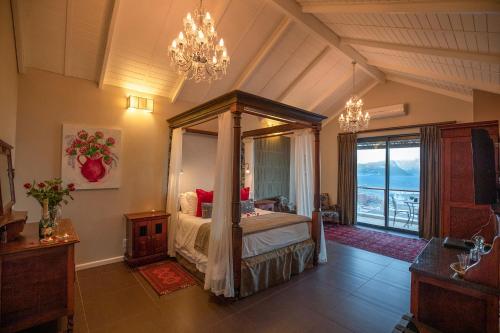 Ένα ή περισσότερα κρεβάτια σε δωμάτιο στο Mariner Guesthouse & Villa