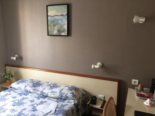 Katil atau katil-katil dalam bilik di Hôtel du Sud Vieux Port