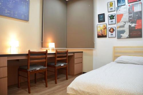 Llit o llits en una habitació de The Collector at Bayu Puteri Mid Valley 2 mins drive