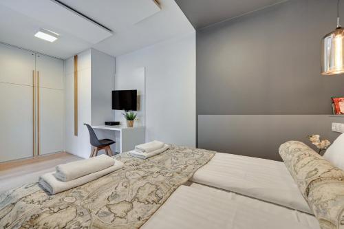 En eller flere senger på et rom på Monte Cassino Chill - Comfy Apartments