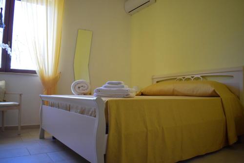 Postel nebo postele na pokoji v ubytování La Dimora dei Ciliegi
