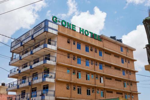 a building with a sign that reads gone hotel at G-One Hotel Kampala in Kampala