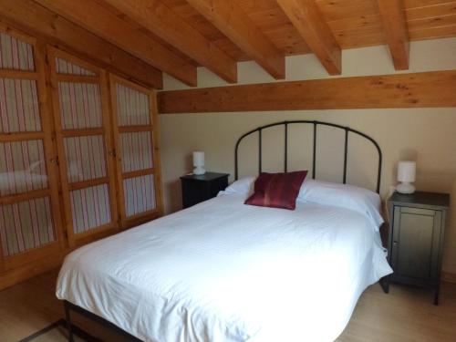 Katil atau katil-katil dalam bilik di La Riega del Peral