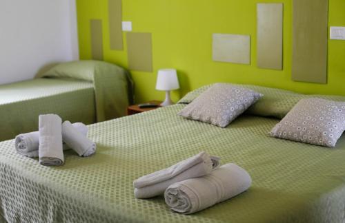 Postel nebo postele na pokoji v ubytování St. Michele b&b