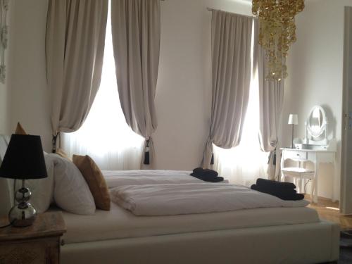 Cama o camas de una habitación en Design Apartment Schönbrunn
