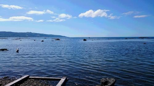 a large body of water with a person in it at Blue 200-1 / Vacation STAY 3808 in Utasutsu