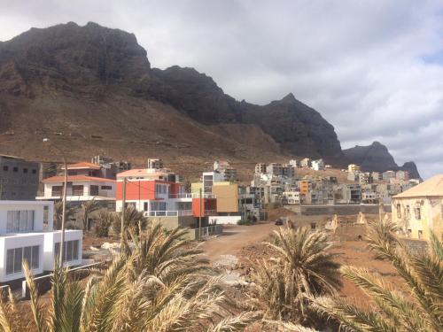 a view of a city with mountains in the background at Sissi's B&B in Ponta do Sol