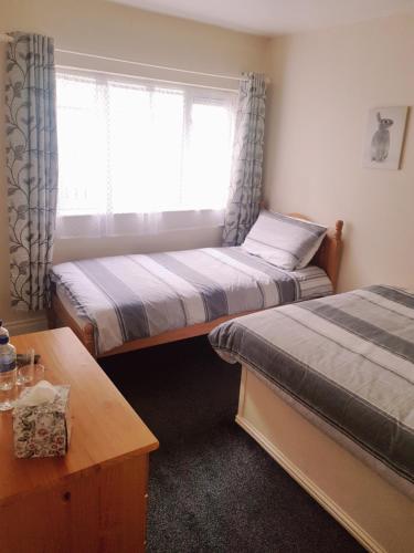Postel nebo postele na pokoji v ubytování Billycan Guest Rooms