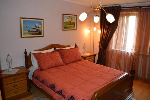 Postel nebo postele na pokoji v ubytování VILA SS KEKEZI