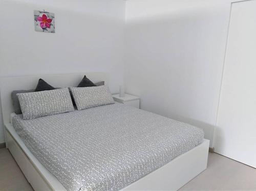 Postel nebo postele na pokoji v ubytování Comfort e semplicità in Playa Paraiso
