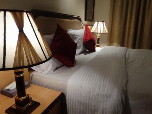 Katil atau katil-katil dalam bilik di Mayfair Hotel