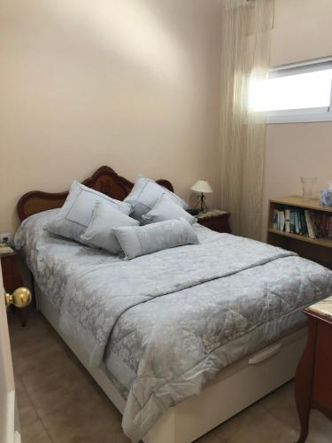 Postel nebo postele na pokoji v ubytování Malibu Playa Apartamento